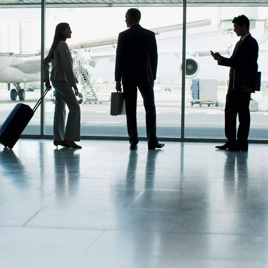 A group of businesspeople at an airport